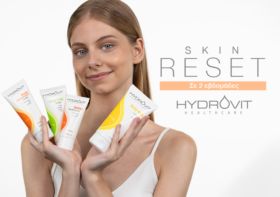 Γυναίκα κρατά προϊόντα ενυδάτωσης HYDROVIT για πρόσωπο και σώμα, προβάλλοντας τη σειρά Skin Reset για αποκατάσταση και λάμψη της επιδερμίδας σε 2 εβδομάδες.